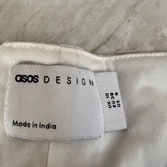 ASOS DESIGN tiered mini skirt in poly plaid in white size 6 - Picture 6 of 9